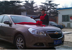 超前涂料獎勵員工轎車，真石漆生產(chǎn)廠家！